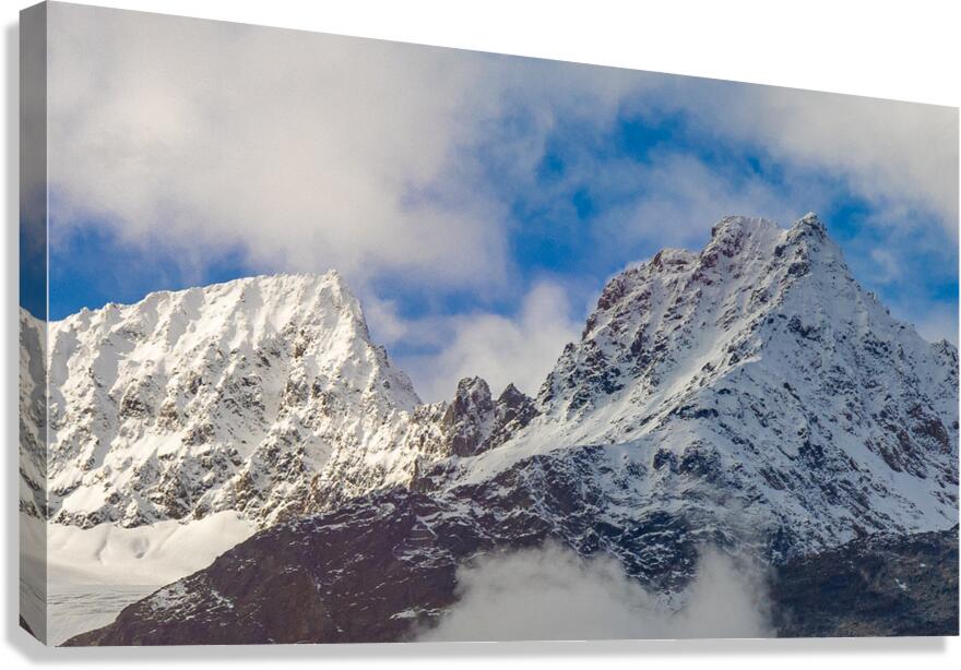 Snow caps Canvas Print